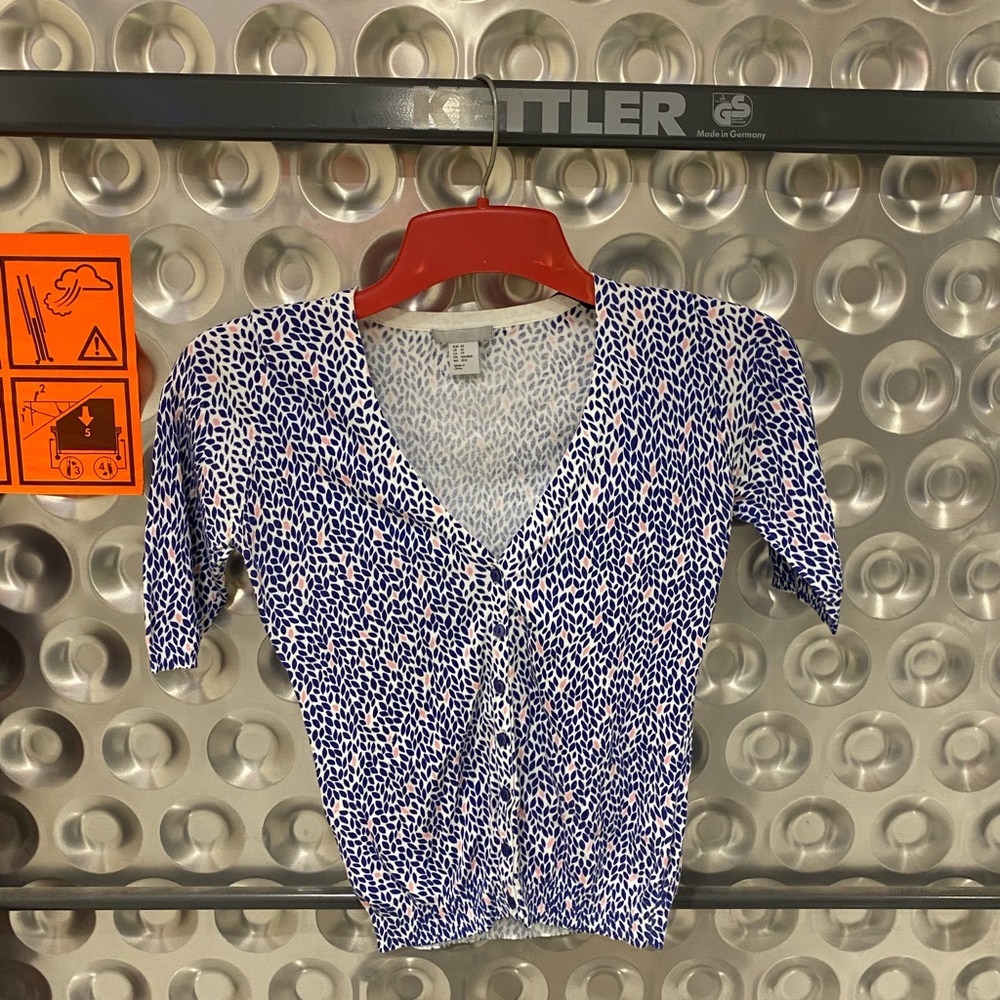 Woman’s buttoned top